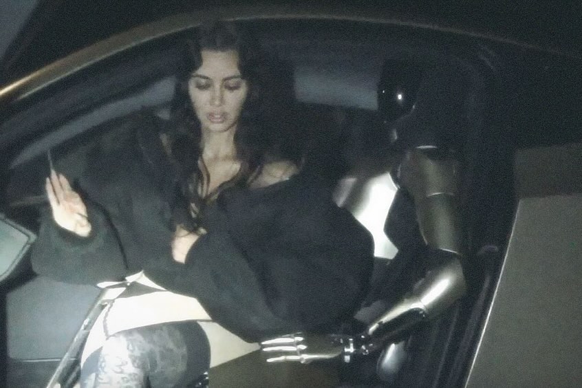 Kim Kardashian with a Tesla Optimus